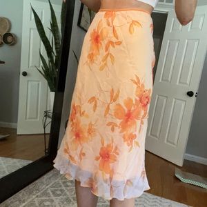 Orange and white floral sort brand wrapper